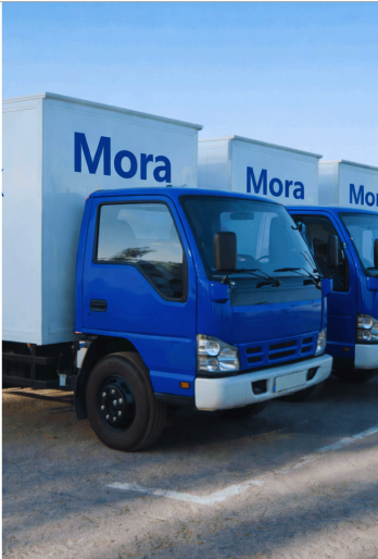Armada truk biru Mora - PT Mora Mitra Logistik